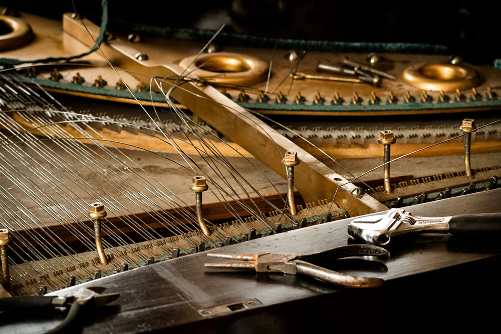 old piano inside, disassemble wire